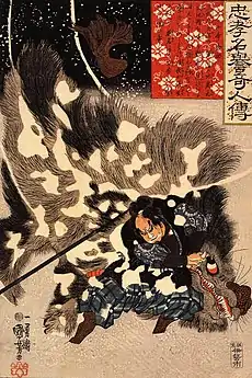 Yamamoto Kansuke fighting a giant boar, in a woodblock print by Utagawa Kuniyoshi