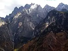 Jagged peaks rising from Yangtze River gorge Yunnan province.