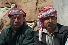 Yazidi men wearing the keffiyeh