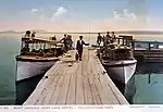 A photo of boats on Yellowstone Lake by F. Jay Haynes