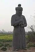 Song tomb guardian wearing a mountain pattern coif, cord and plaque, and a lamellar skirt