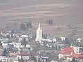 A closer view of the village from the castle, with the Church of Saint Margaret of Antioch seen prominently (March 2012)