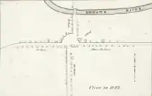 A black-and-white map, depicting buildings and roads in simple, small black outlines. The text "Utica in 1802" is at bottom right.