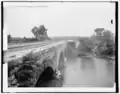 The Conococheague Aqueduct during the canal's operating days, c. 1903, before the wall collapsed.