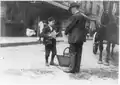 Lewis Hine documented child labor at street markets in Boston and other cities in the early 1900s