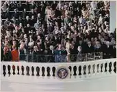 At his inauguration, Jimmy Carter takes the oath of office to succeed Gerald Ford as president. Betty Ford stands in the lower-left corner of this image