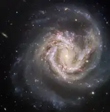 Spiral galaxy Messier 61 is aligned face-on towards Earth.